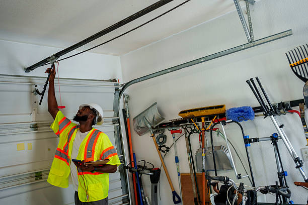 Professional Garage Door Panel Replacement technician working in Neosho County County, KS